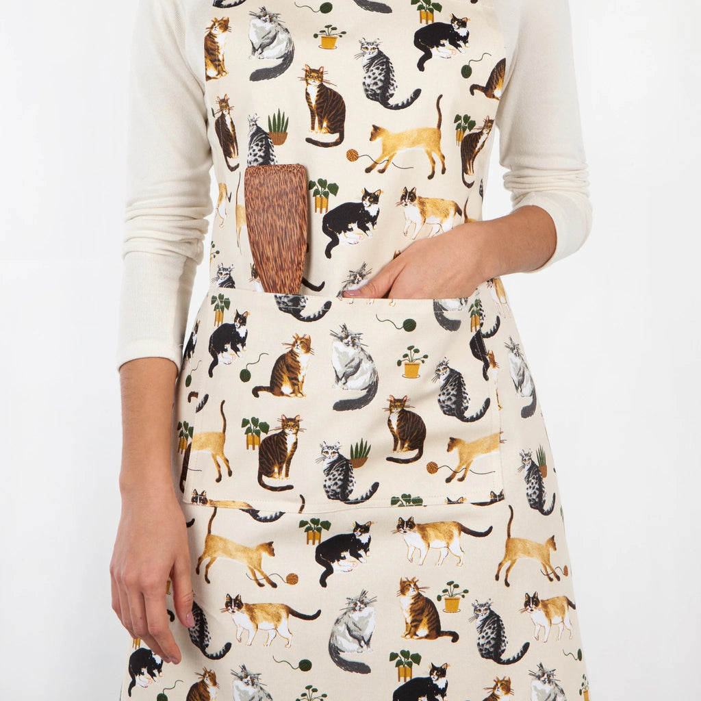 Cat Collective chef apron on woman.