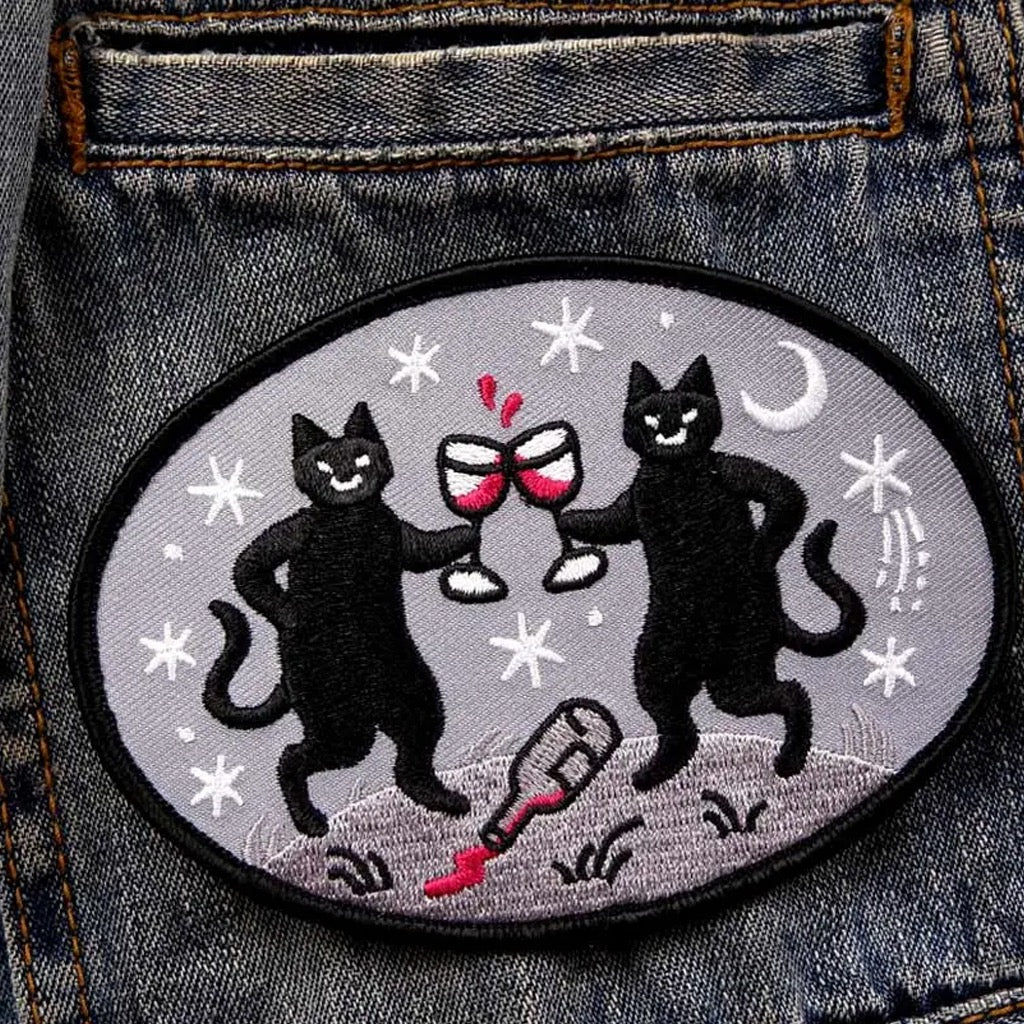 Cheers! (Wine Cats) Embroidered Patch on denim jacket.