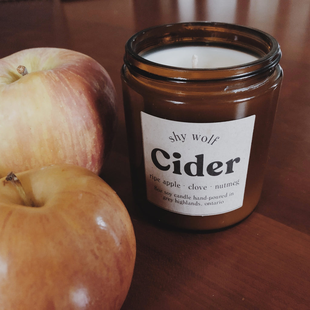 Cider Soy Wax Candle on table.