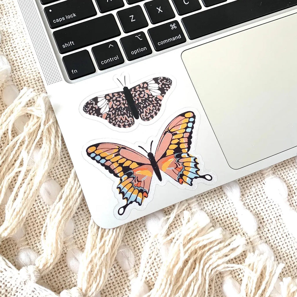 Clear Mosaic Pink and Brown Butterfly Sticker on computer.