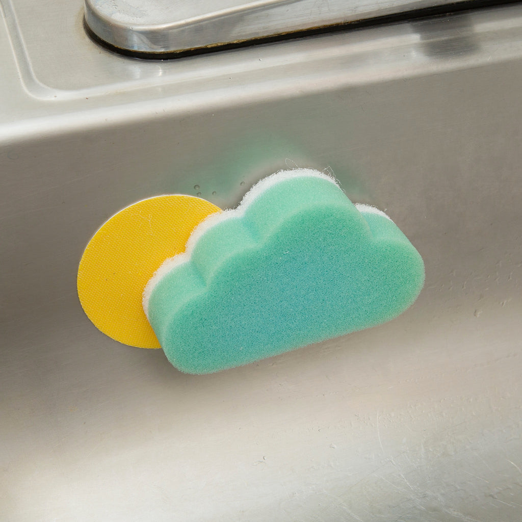 Cloud Grab 'N Scrub on sink.