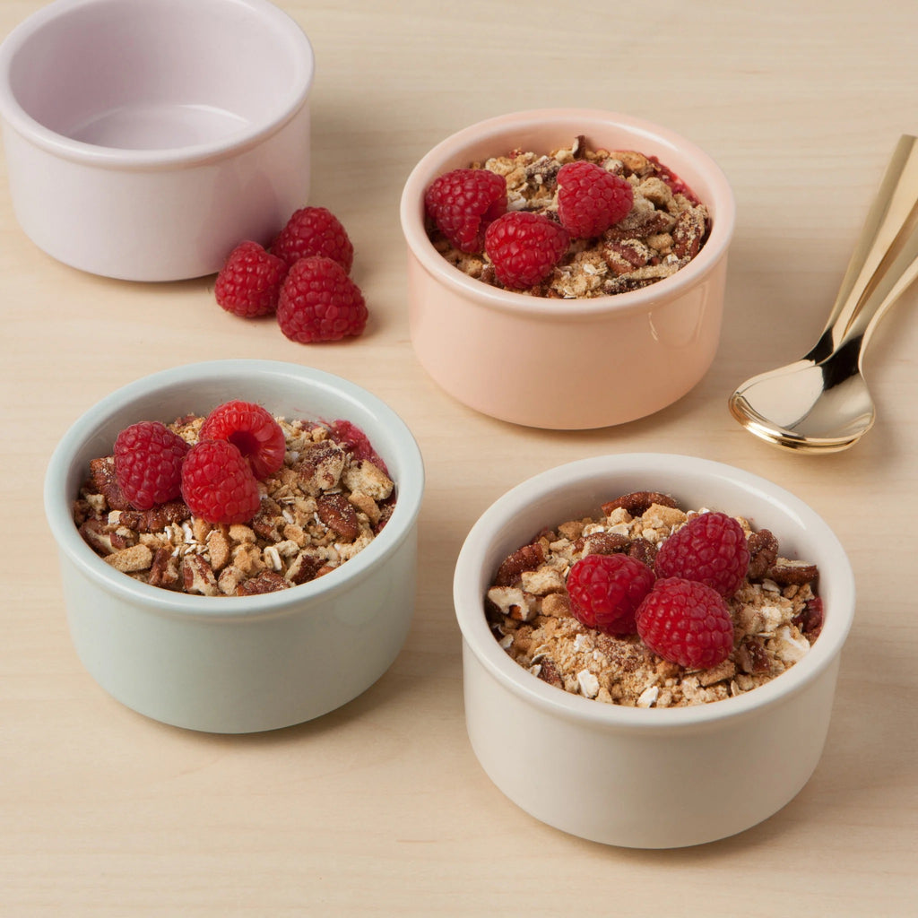 Cloud ramekins with cereal in them.