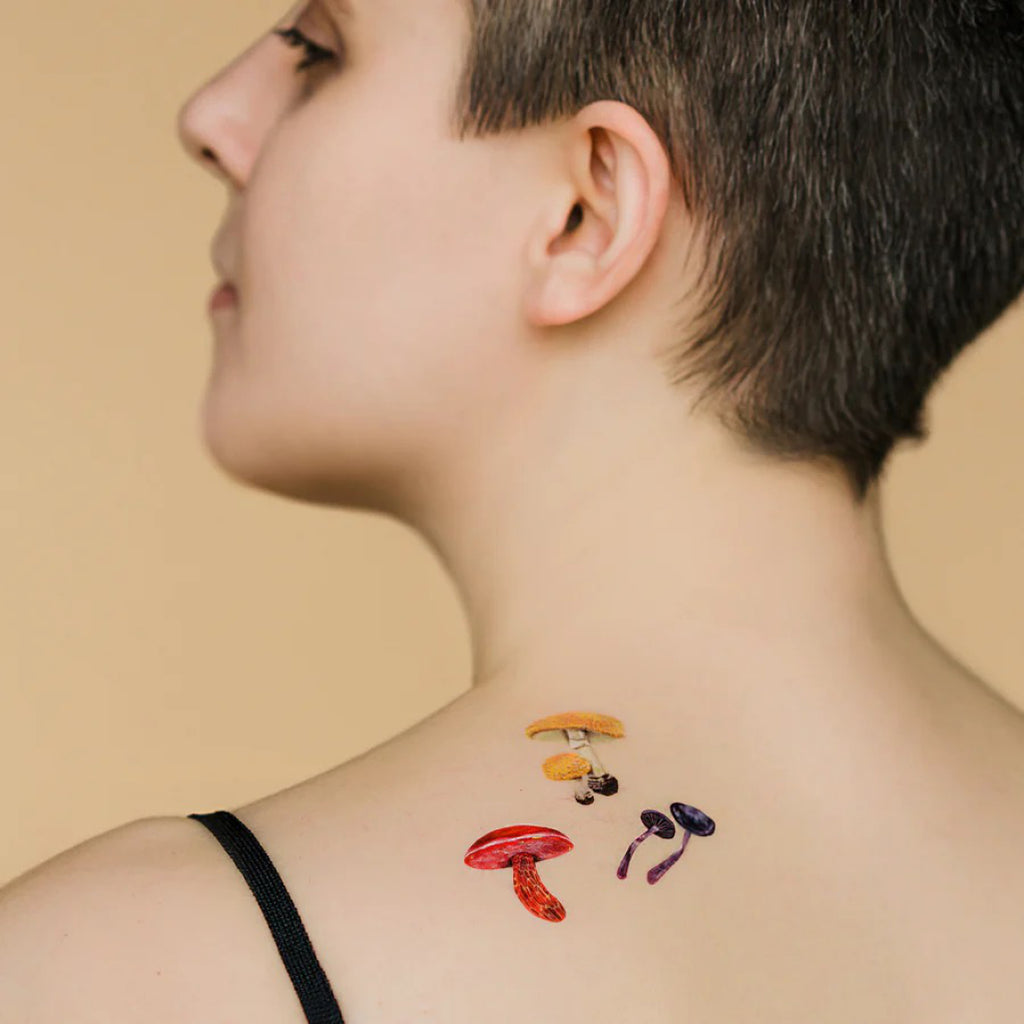 Colorful Mushrooms Tattoos on shoulder.