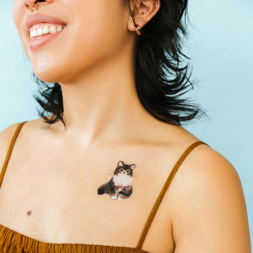 Curious Cat Tattoo Set of Two on chest.