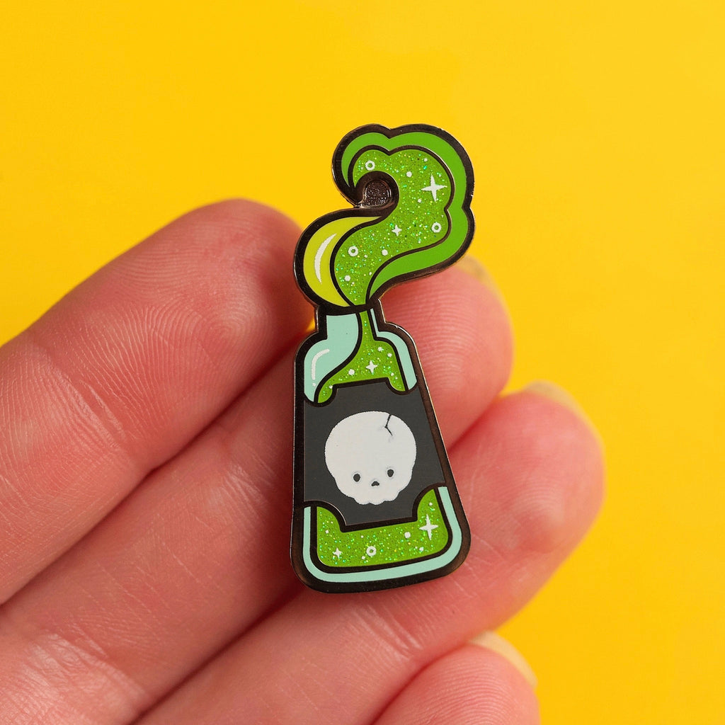 Death Potion Pin in hand.