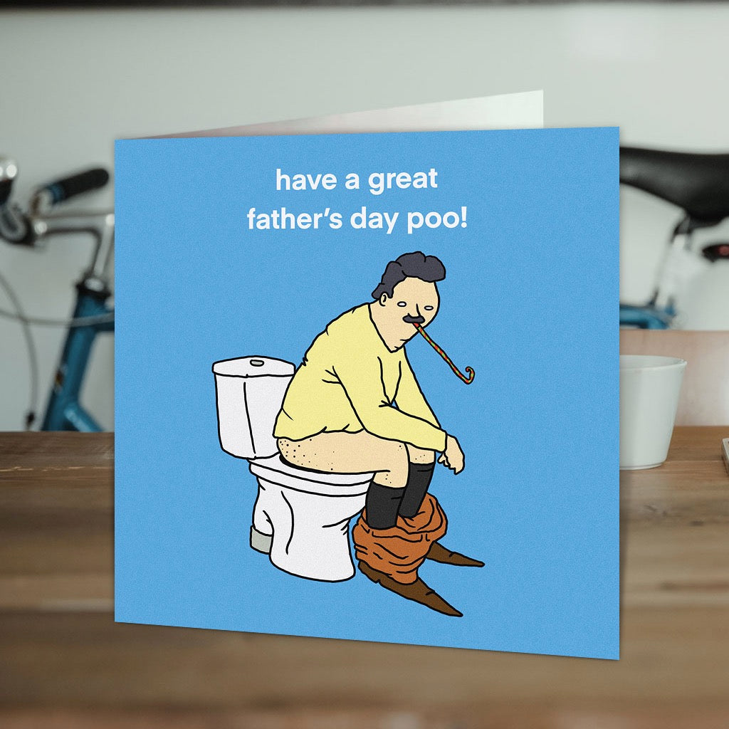 Father's Day Poo Card on table.