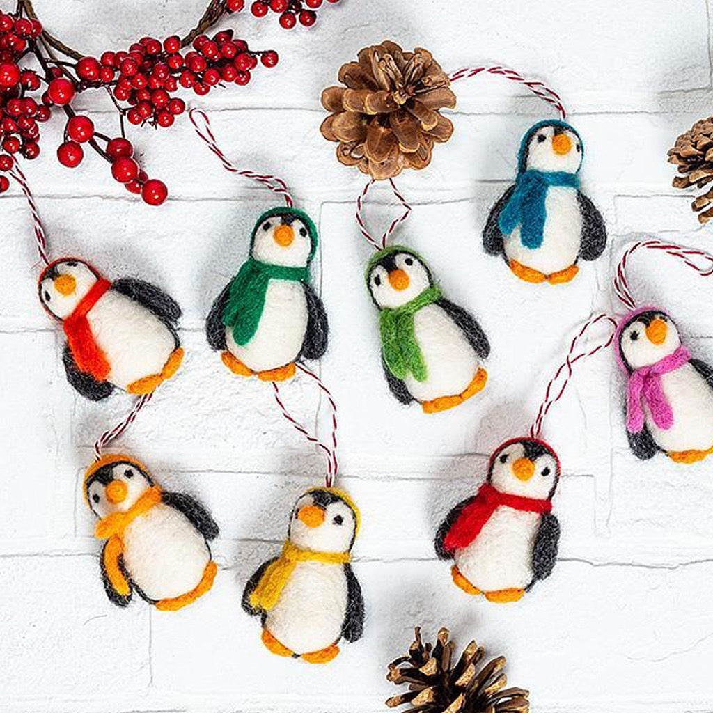 Felted Penguin In Hat Ornament hanging.