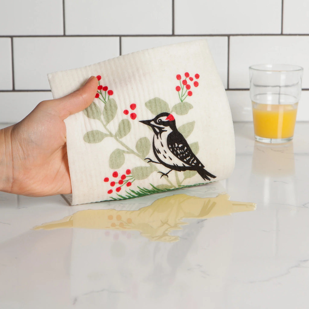 Forest Woodpecker Swedish Dishcloth cleaning spill.