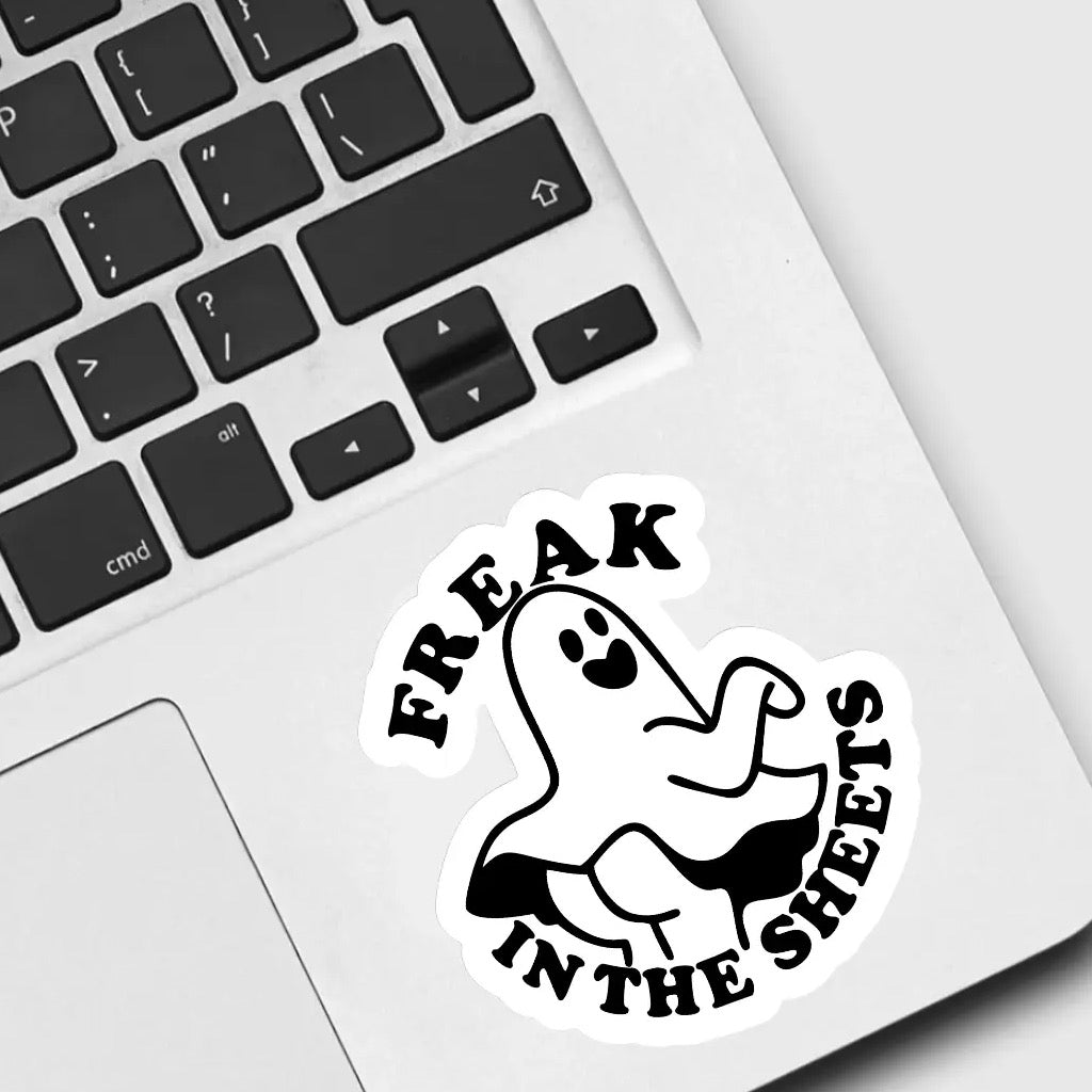 Ghost Freak in the Sheets Sticker on laptop.