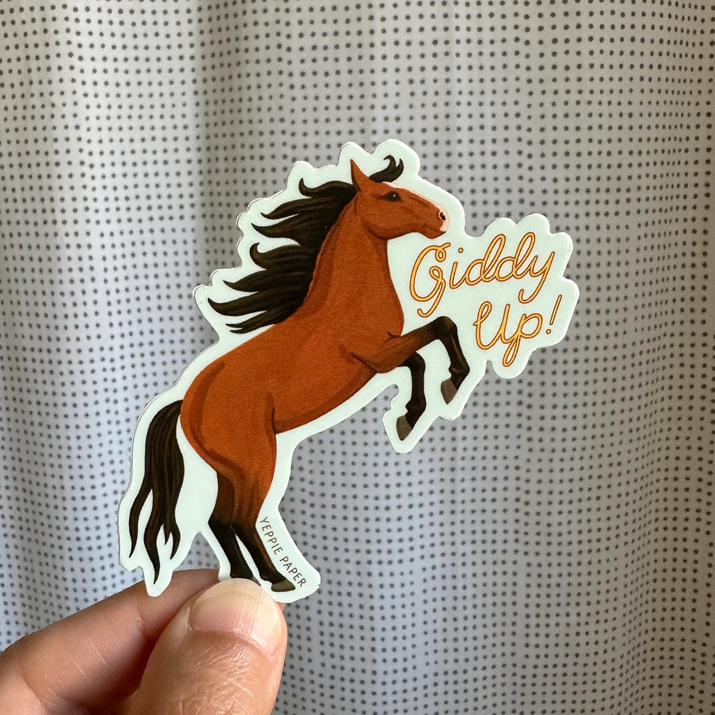 Giddy Up Horse Sticker Person holding.
