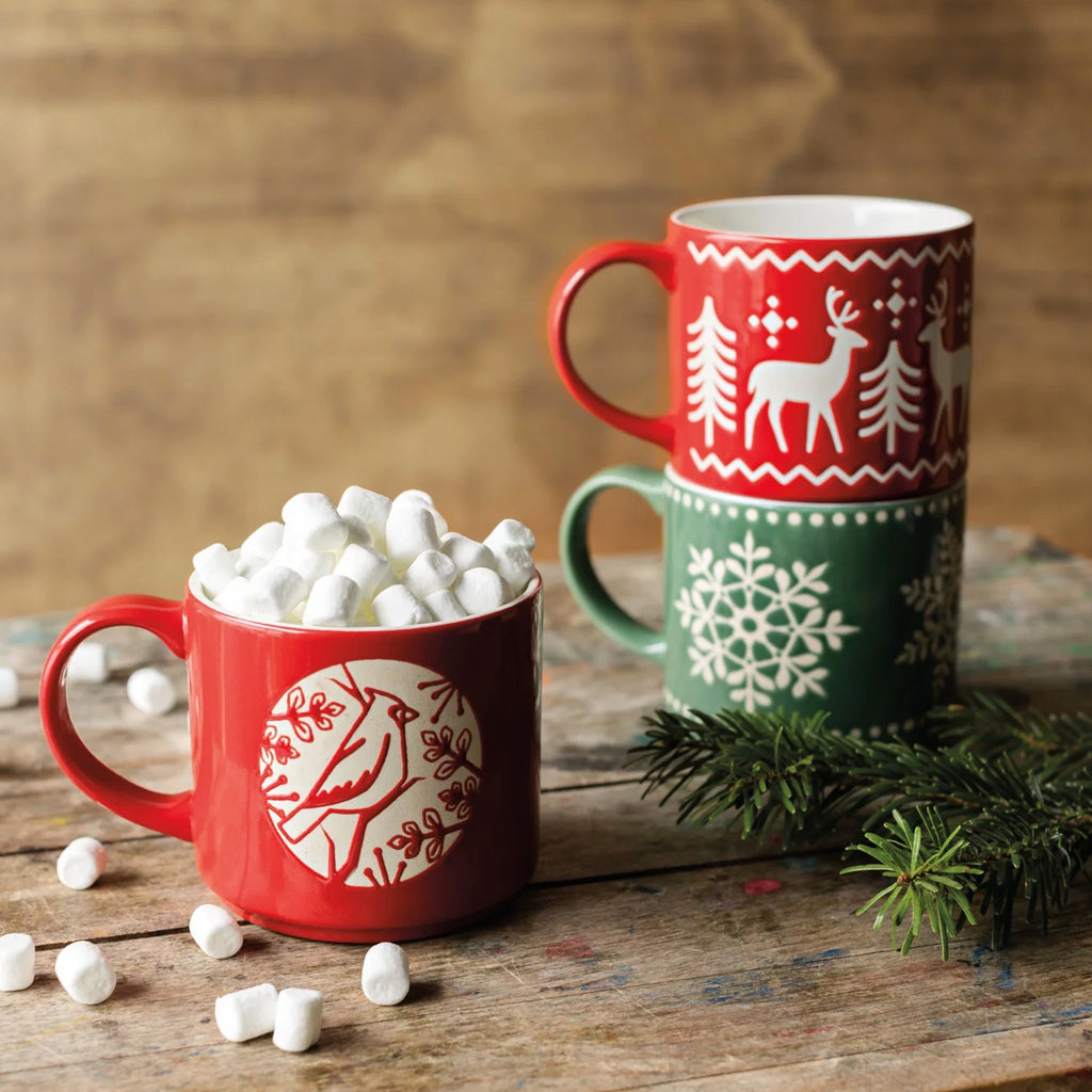 Good Tidings snowflake stacking mug on table, stacked and with marshmellows in them.