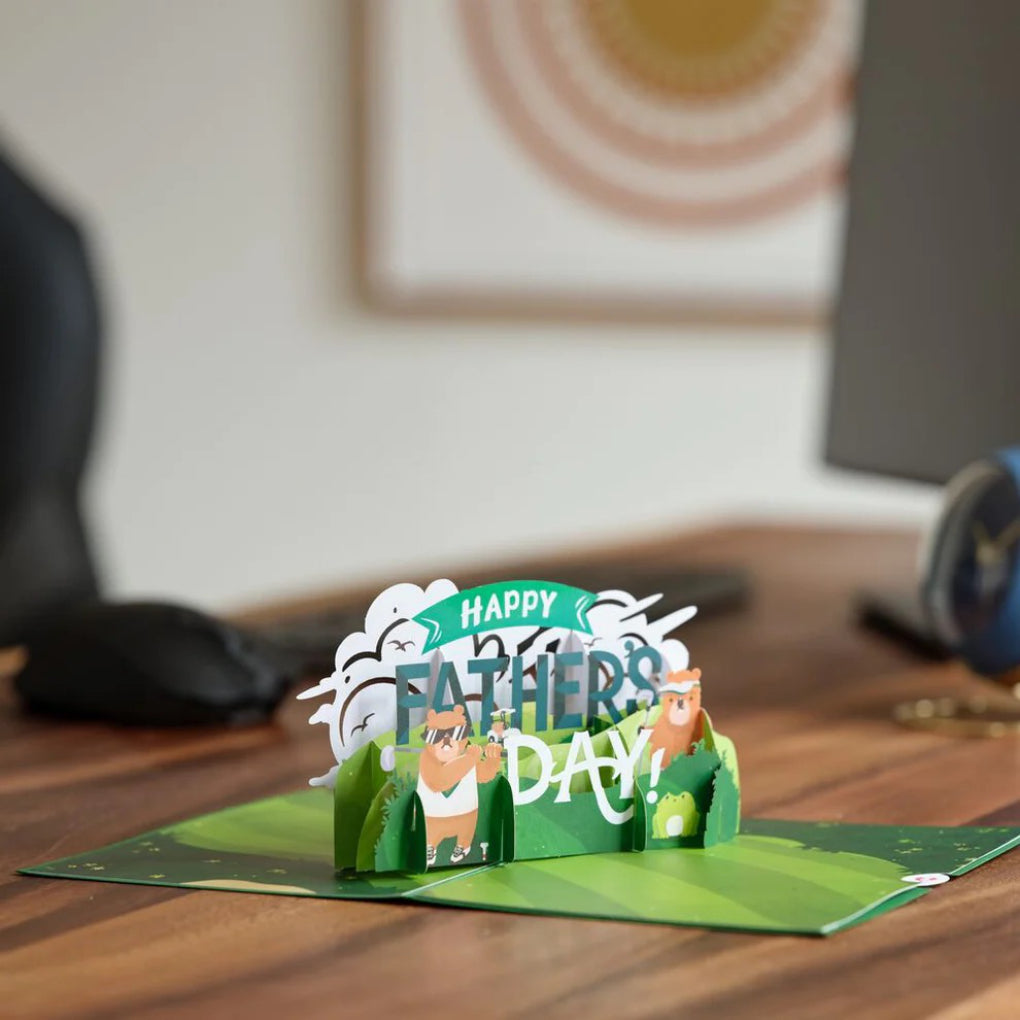 Happy Father's Day Golf Pop-Up Card on table.