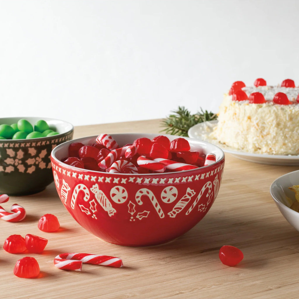 Holly Jolly candy bowls on table.