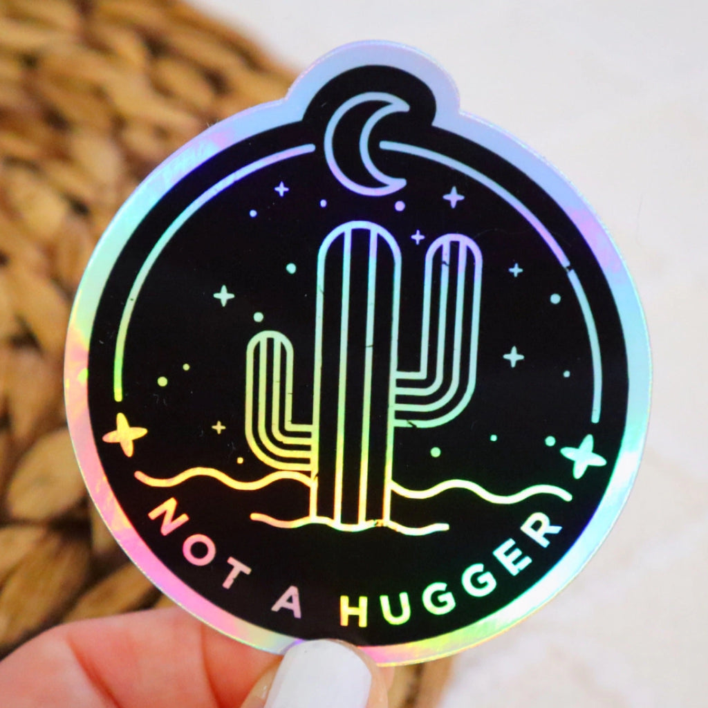 Holographic Not A Hugger Sticker.