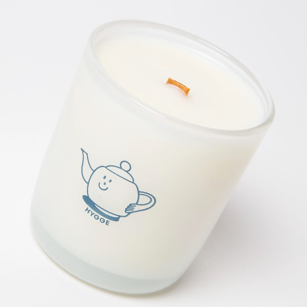 Hygge Coconut Soy Candle on surface.
