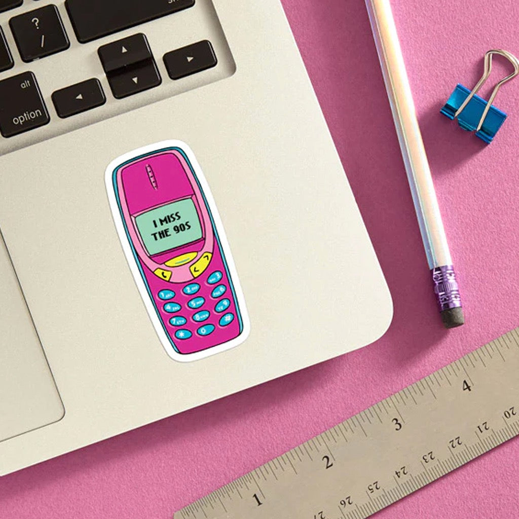 I Miss the 90's Die Cut Sticker on laptop.