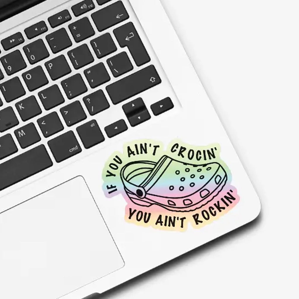 If You Ain't Crocin' Holographic Sticker on computer.