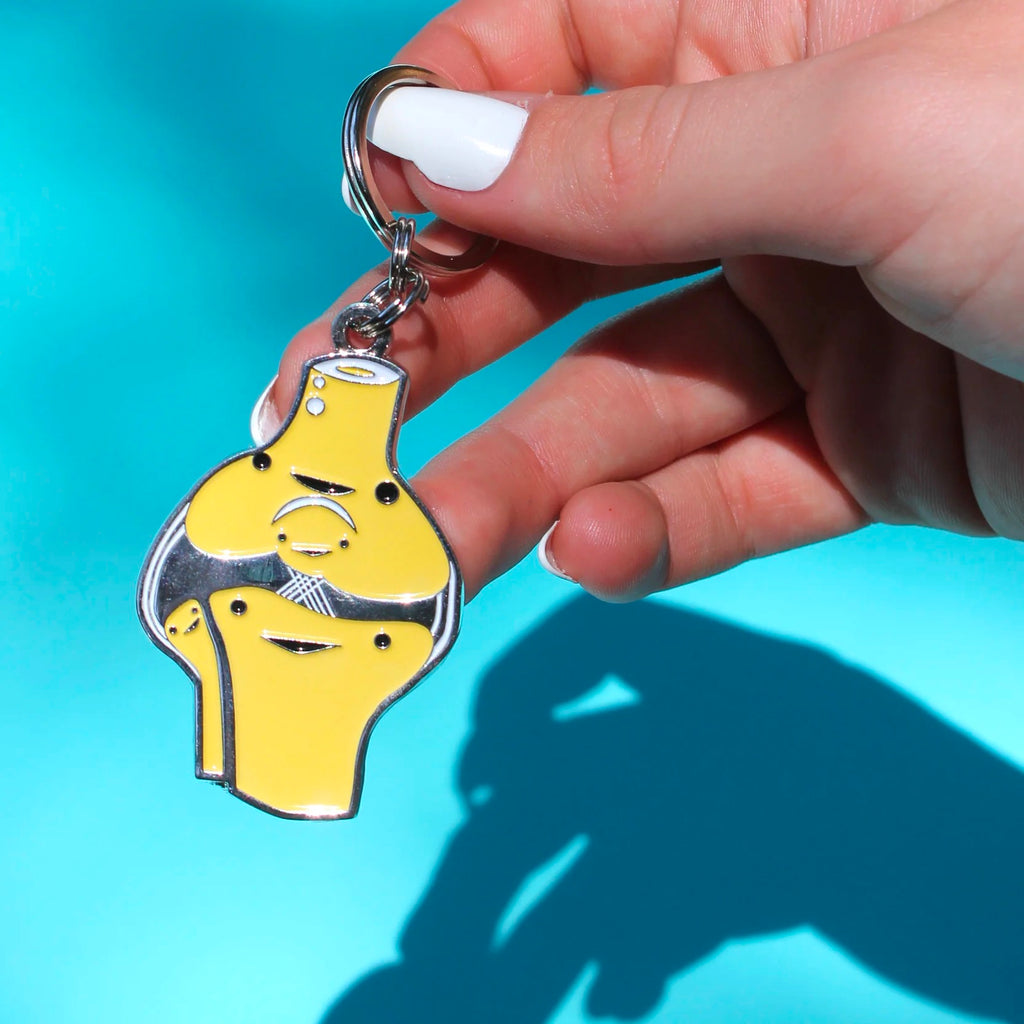 Knee Enamel Keychain size.