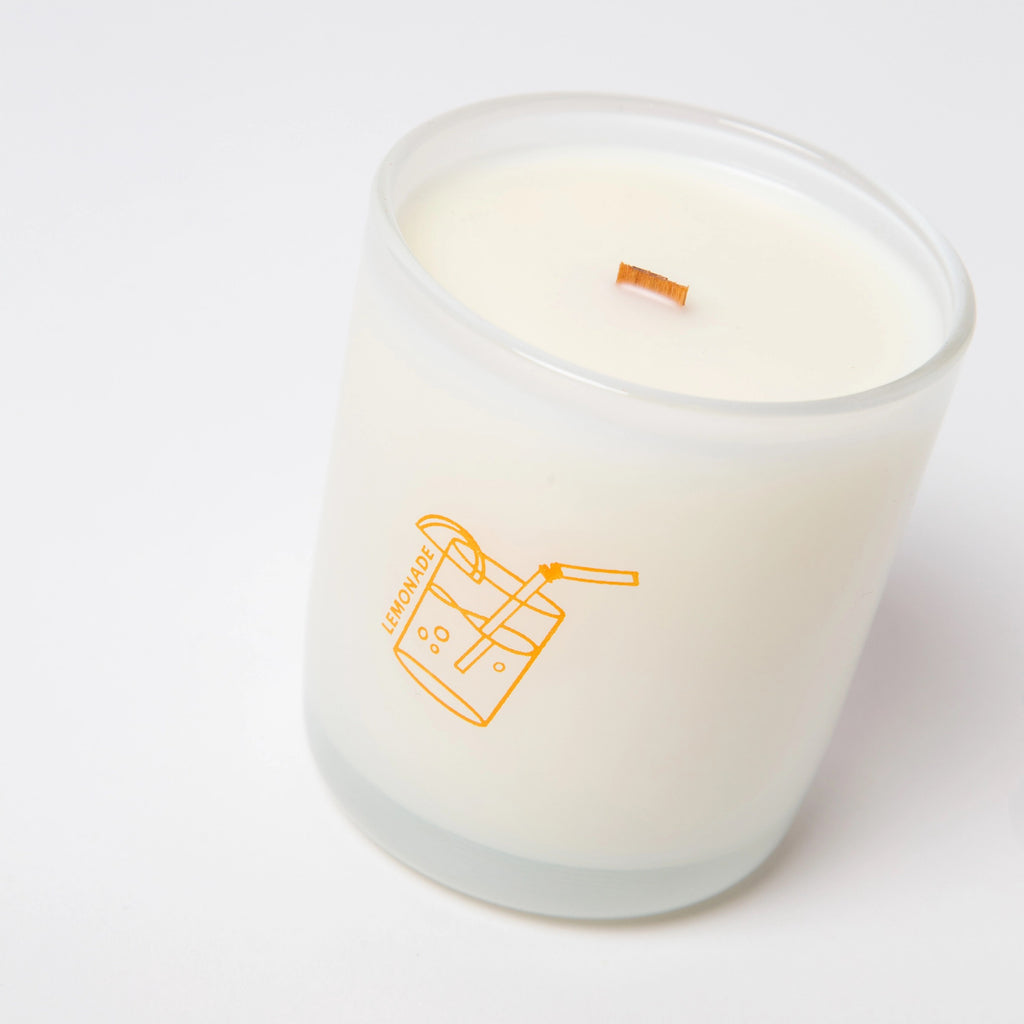 Lemonade Coconut Soy Candle on surface.