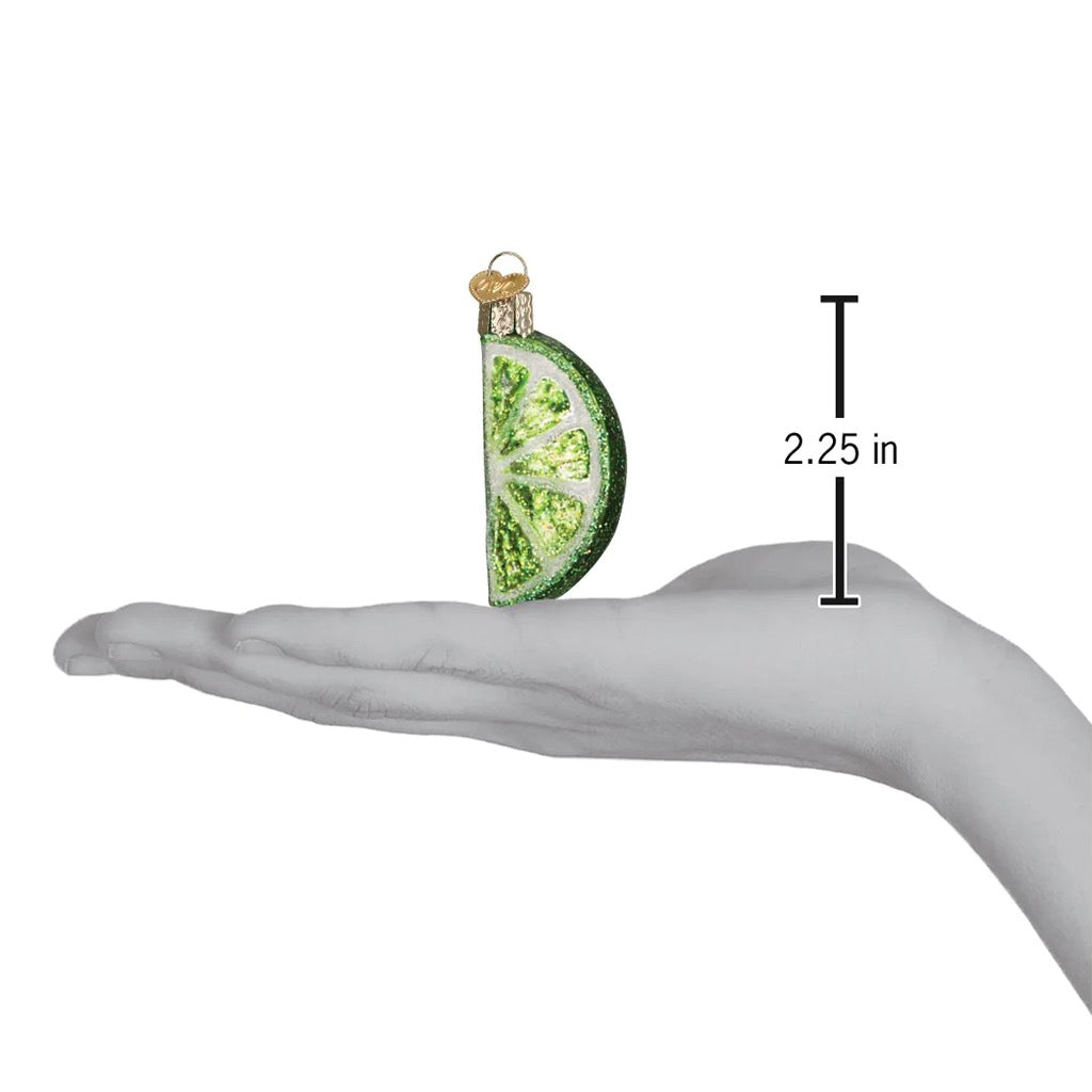 Lime Slice Ornament in hand.