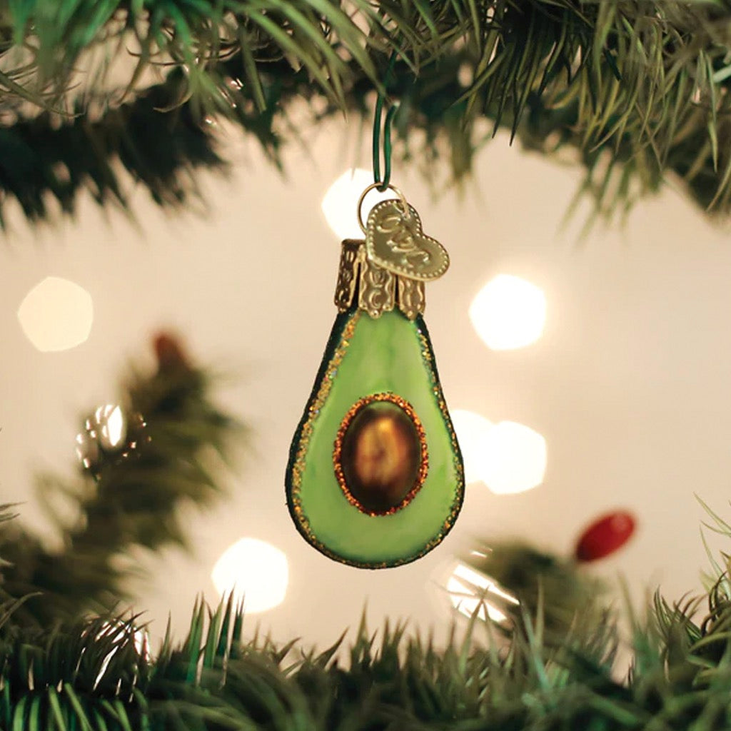 Mini Avocado Ornament in tree.
