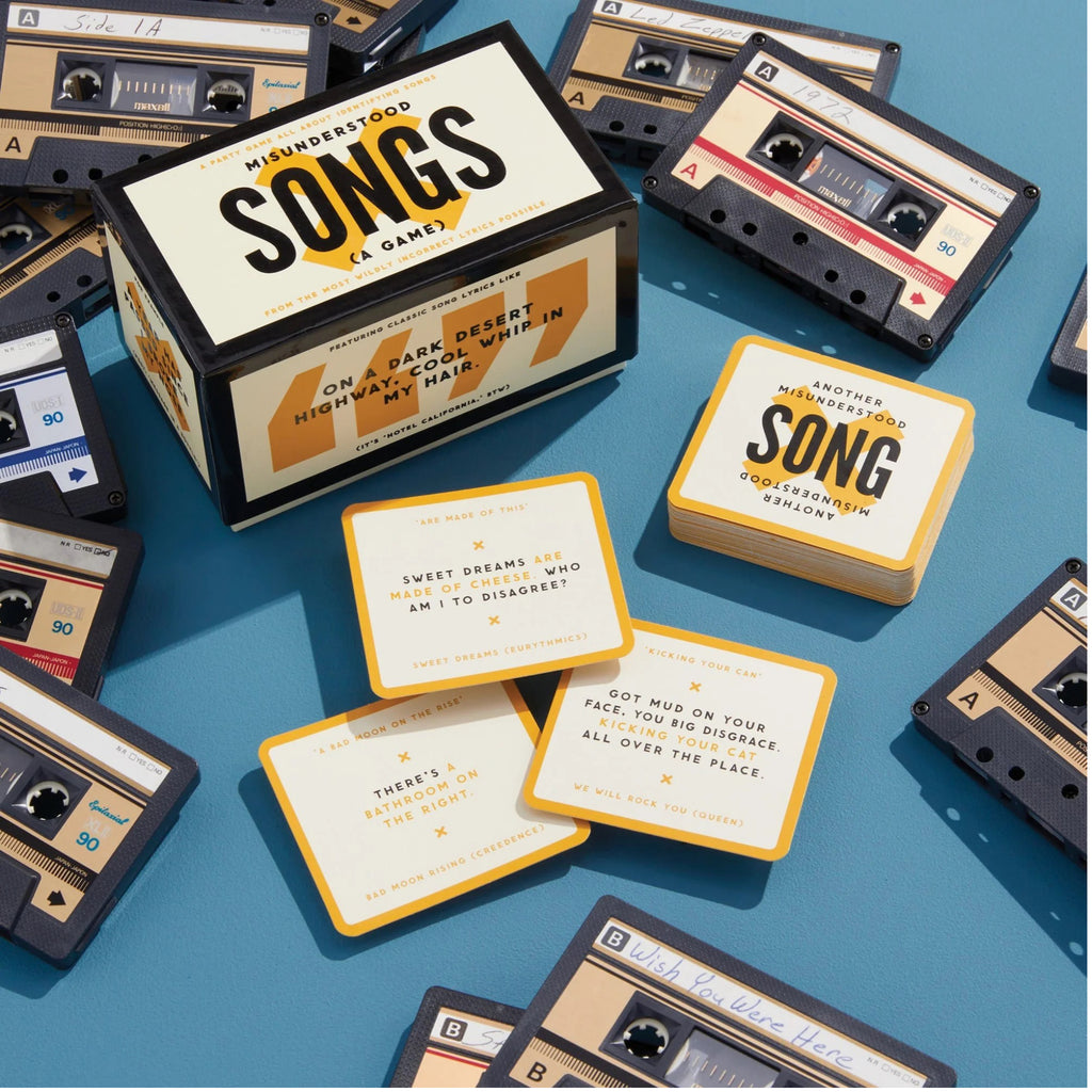 Misunderstood Songs Game box with cards.