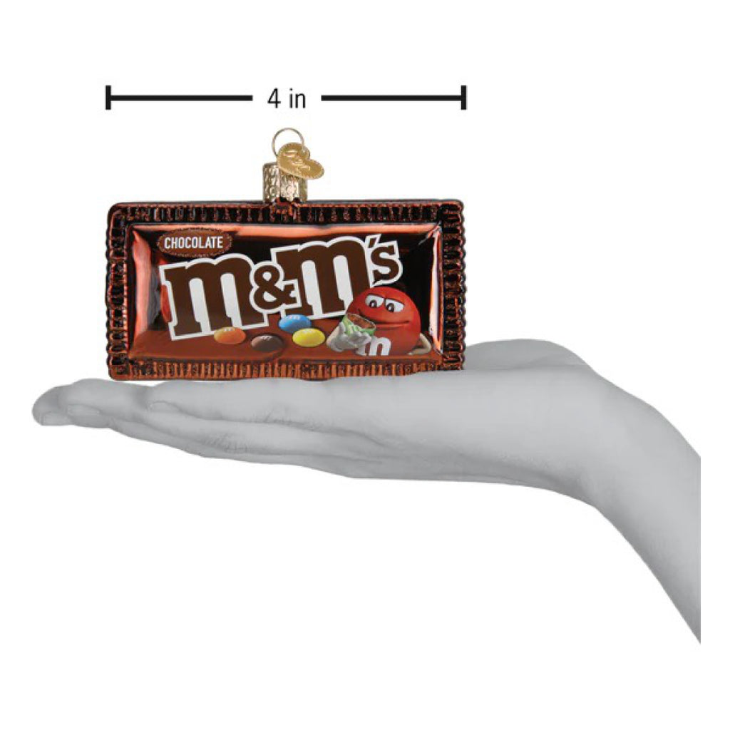 m&m's Milk Chocolate Ornament being held.