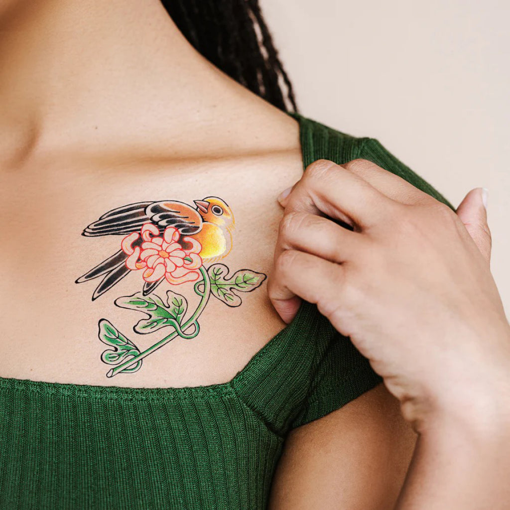 Noble Bird Tattoo on chest.