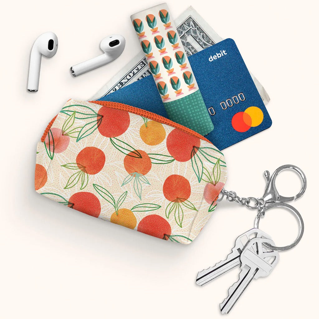 Orange Whimsy Key Chain Pouch filled.