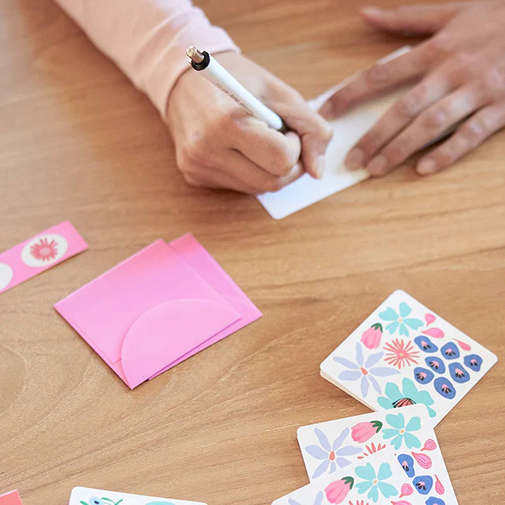 Person using Botanical Bliss Mini Note Card Set with Stickers.
