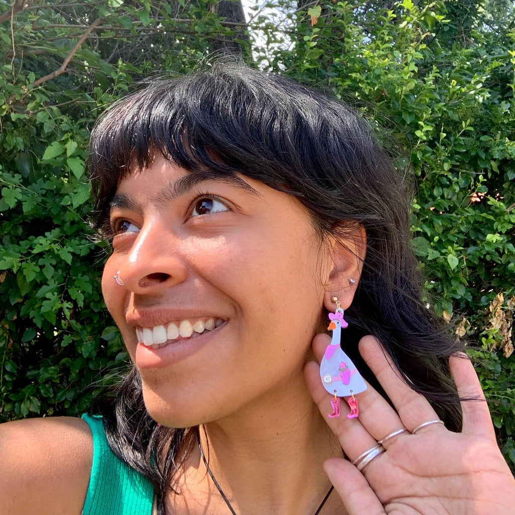 Person wearing Dolly Goose Earrings.