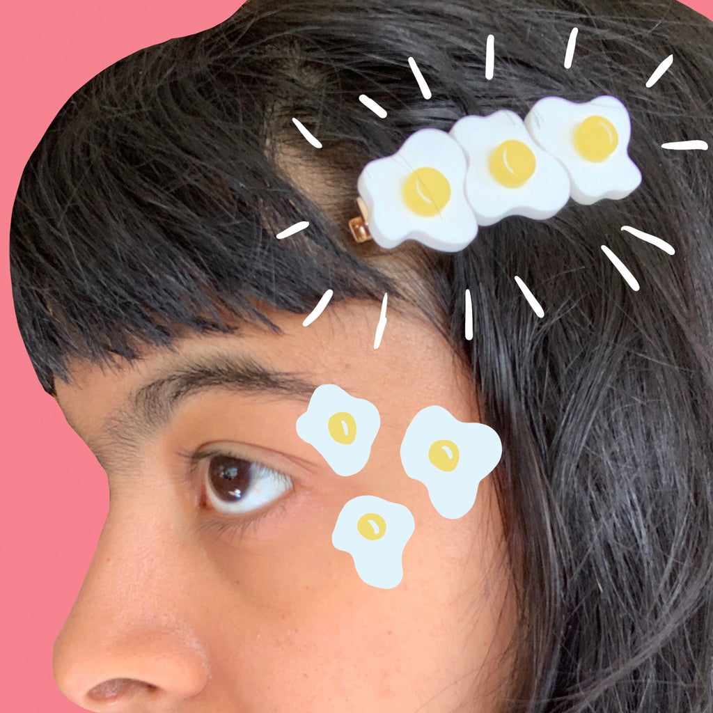 Person wearing Egg Hair Clip.