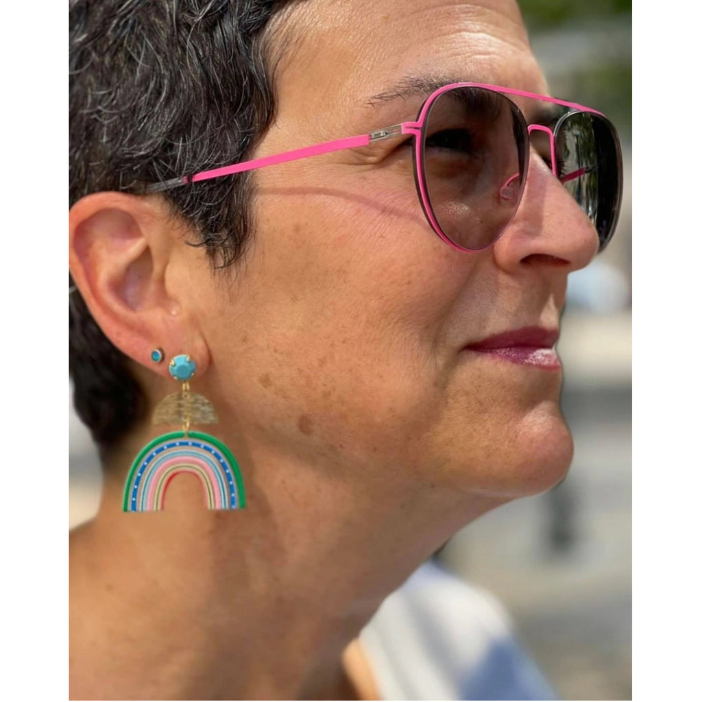 Person wearing Happy Rainbow Statement Earrings.