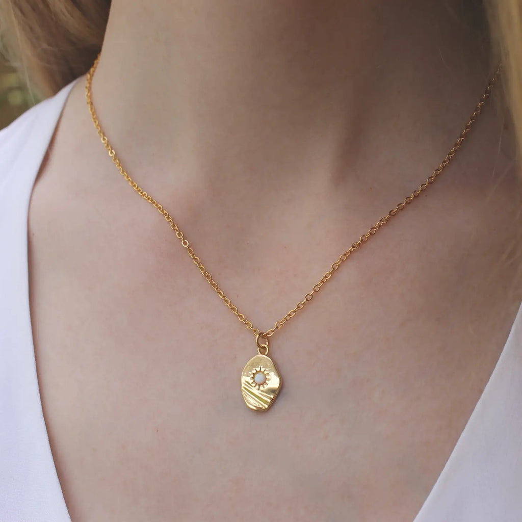Person wearing Opal Disc Necklace.