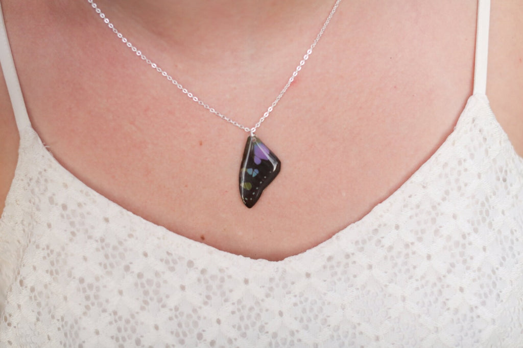 Person wearing Purple Spotted Butterfly Forewing Necklace Silver.