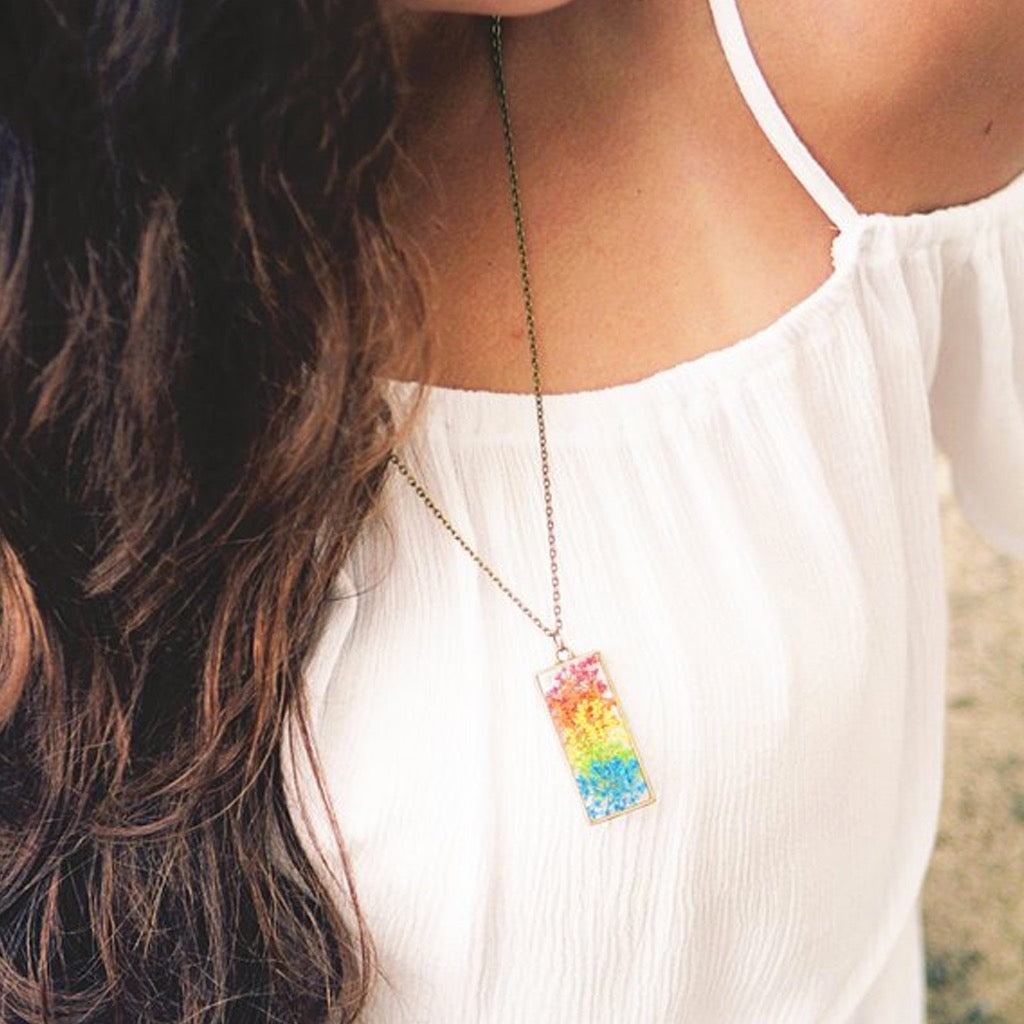 Person wearing Rainbow Queen Annes Lace Flower Necklace.