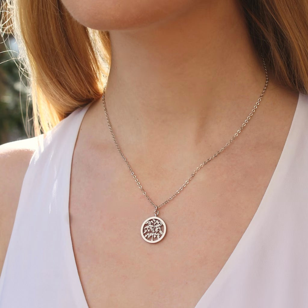 Person wearing Silver Tree Necklace.