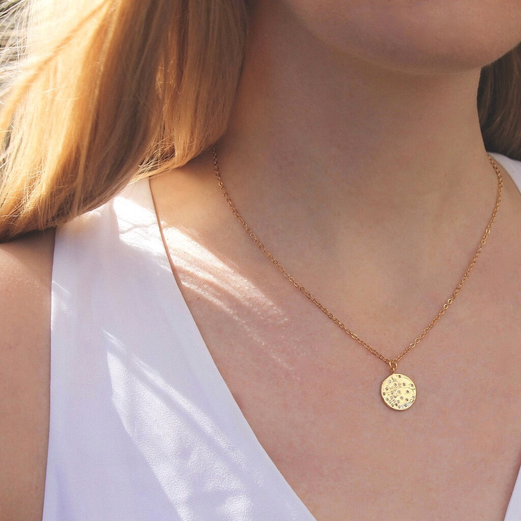 Person wearing Starlight Disc Necklace.