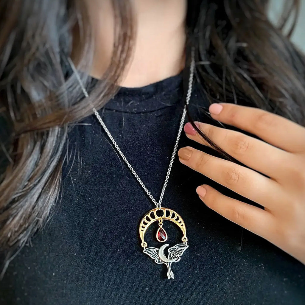 Person wearing Teardrop Moon Phase Necklace Red.