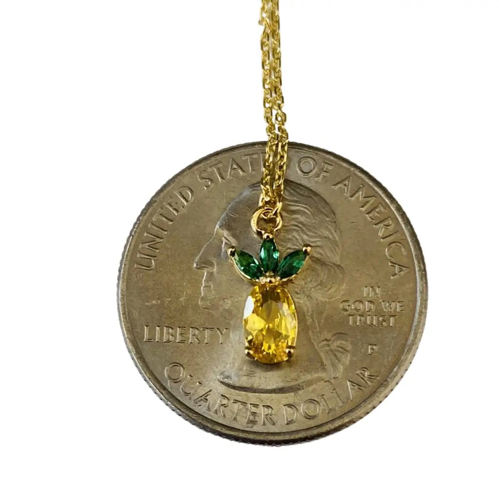Pineapple Necklace on coin.