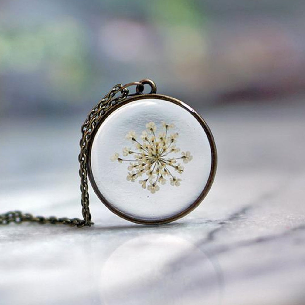 Queen Anne's Lace Necklace on table.
