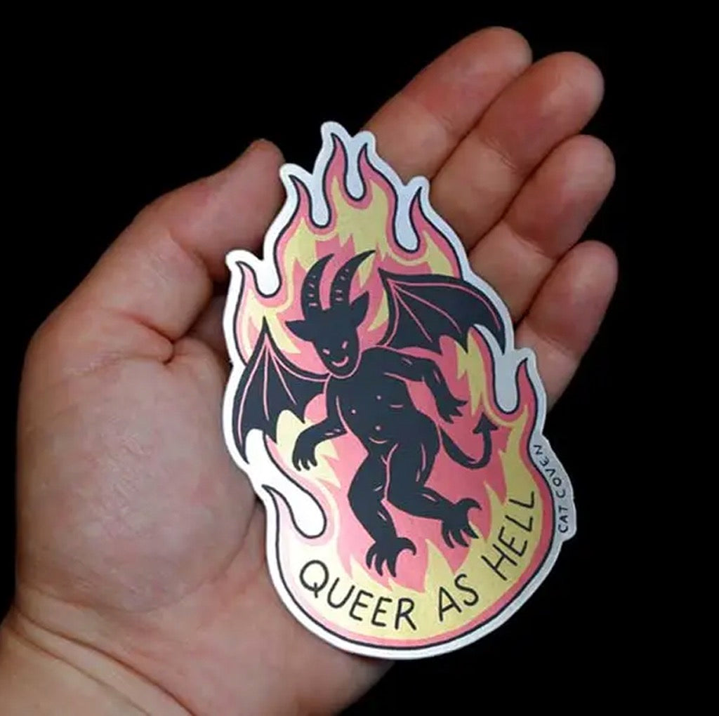 Queer As Hell Matte Mirror Sticker on hand.