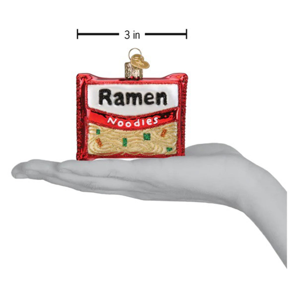 Ramen Noodles Ornament being held to show measurements.