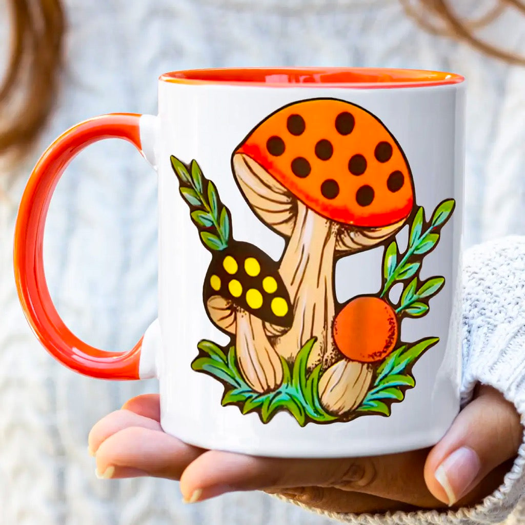 Retro Mushroom Mug with Orange Handle.