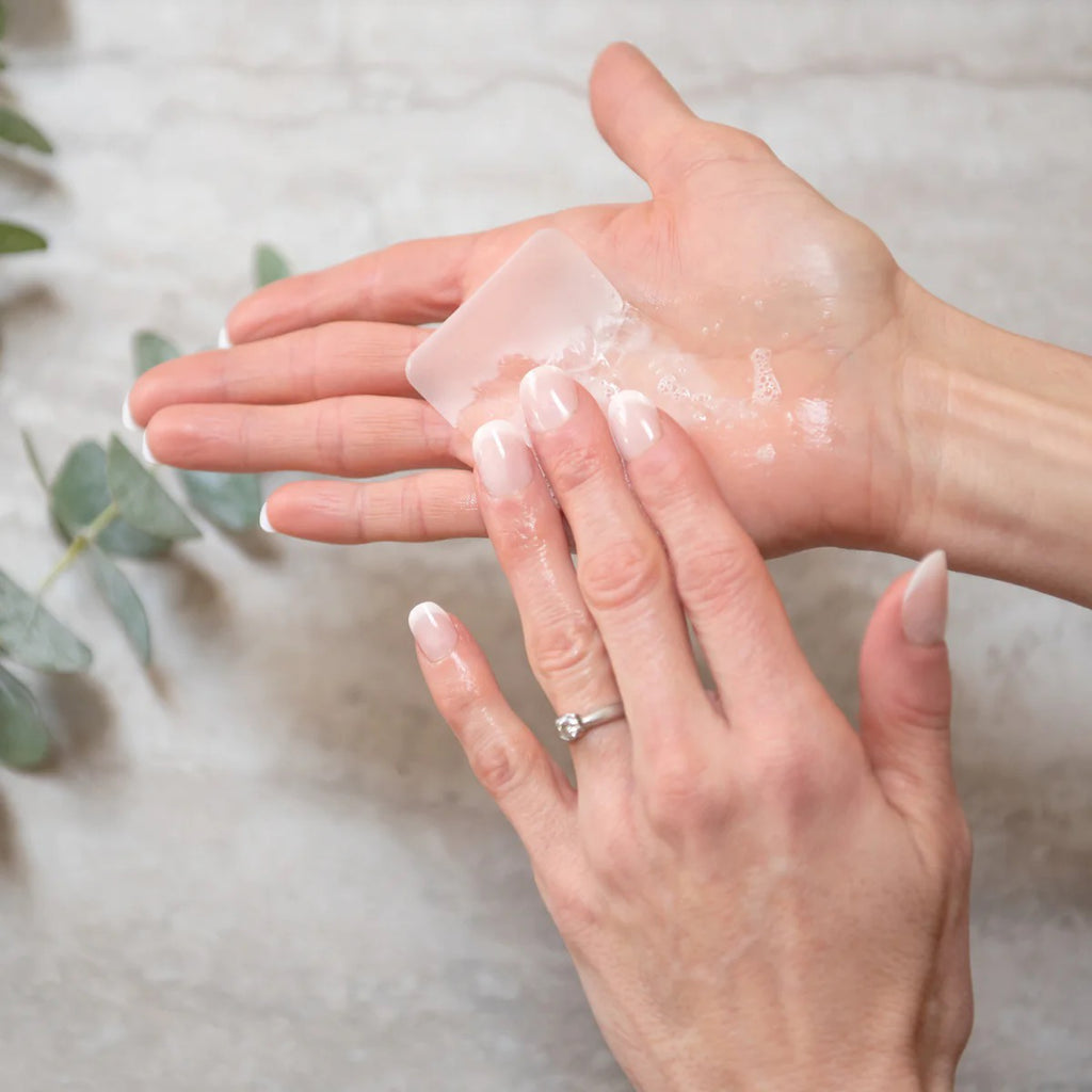 Sassy Citrus Single-Use Soap Sheets being used.