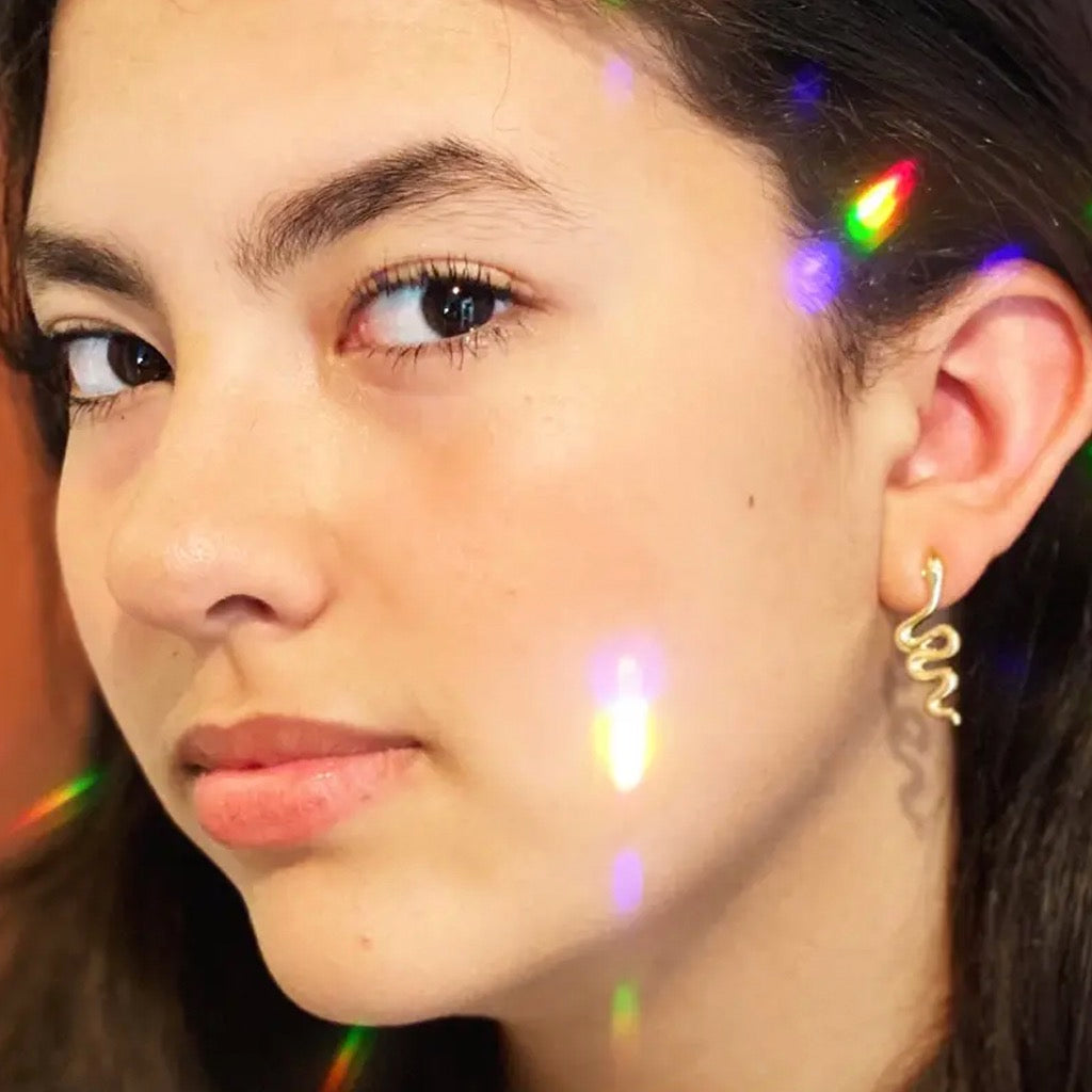 Serpent Studs Person wearing.
