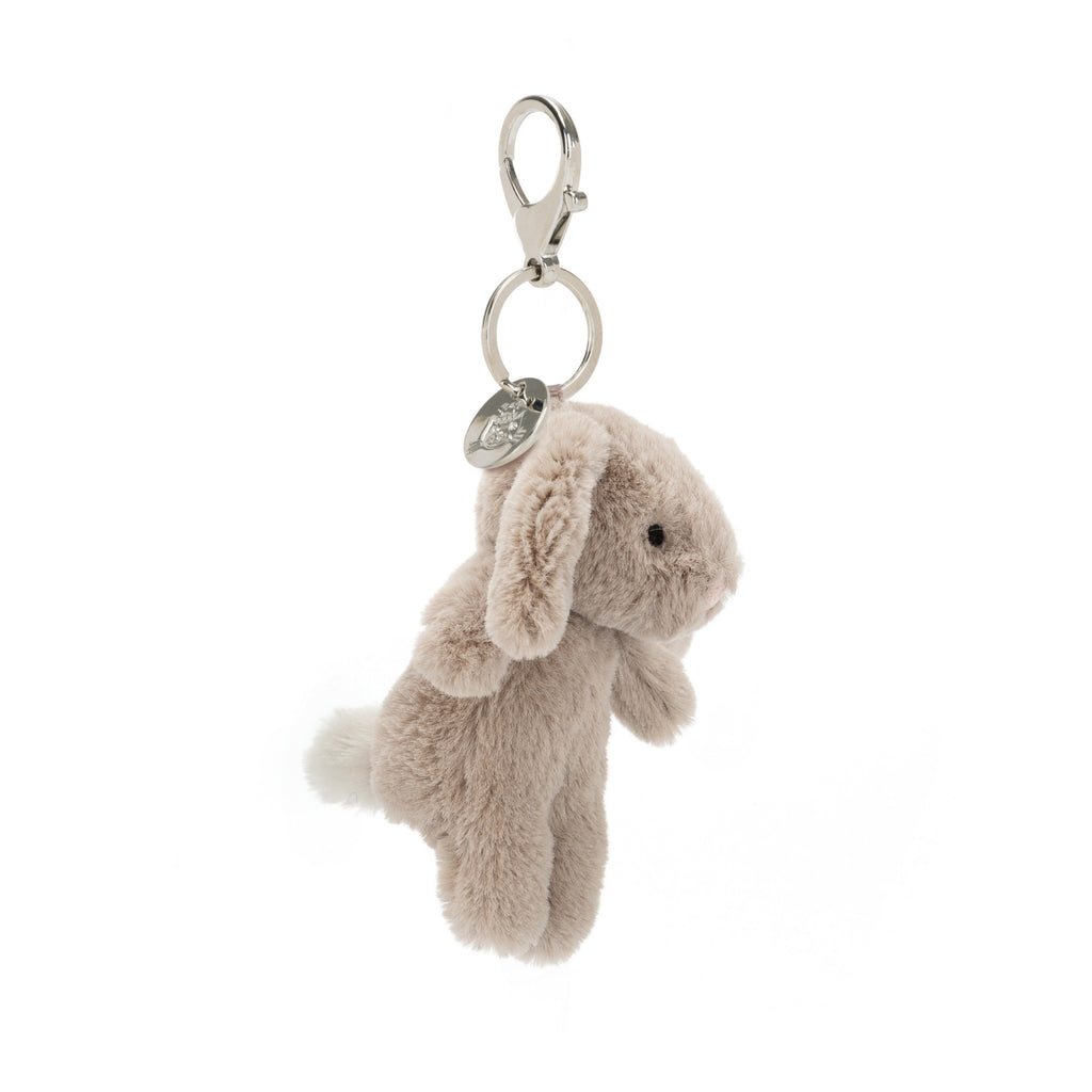 Side of Jellycat Blossom Beige Bunny Bag Charm.