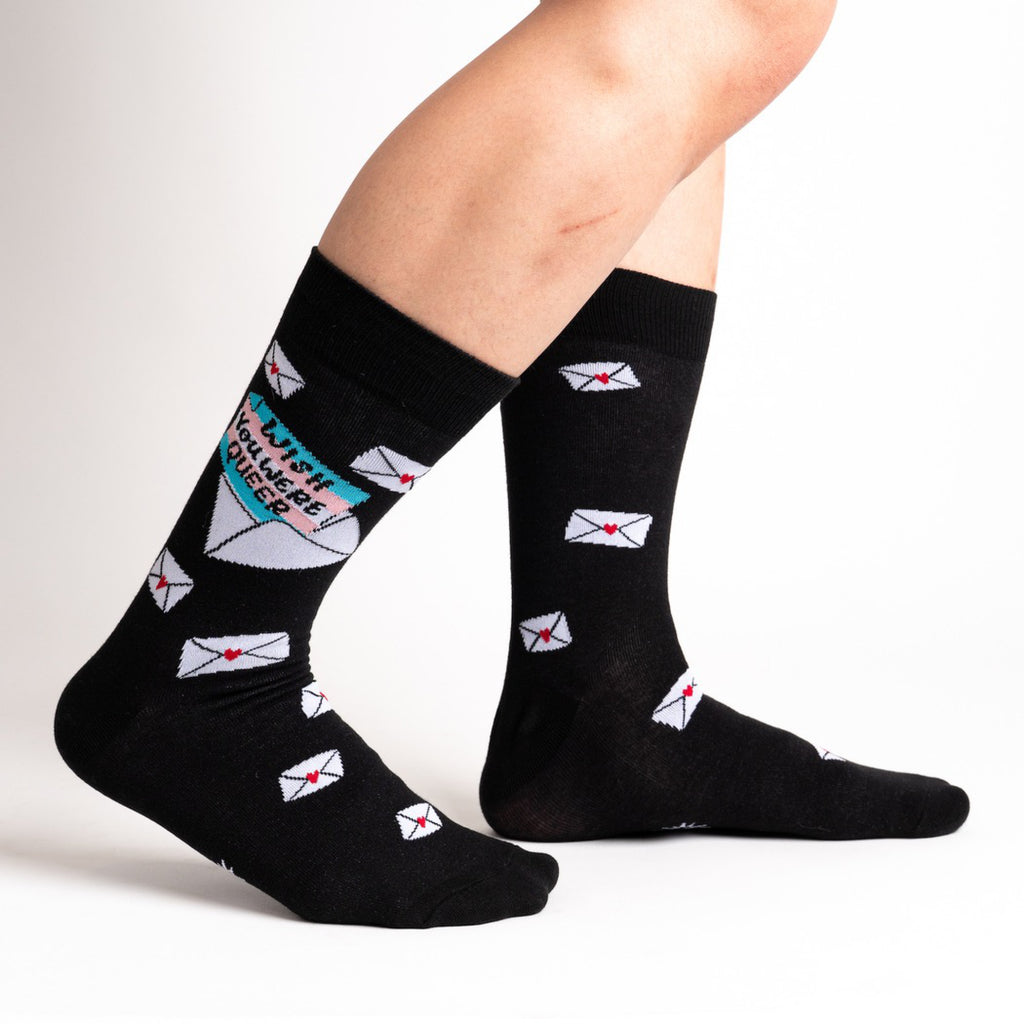 Side of Wish You Were Queer Unisex Crew Socks.