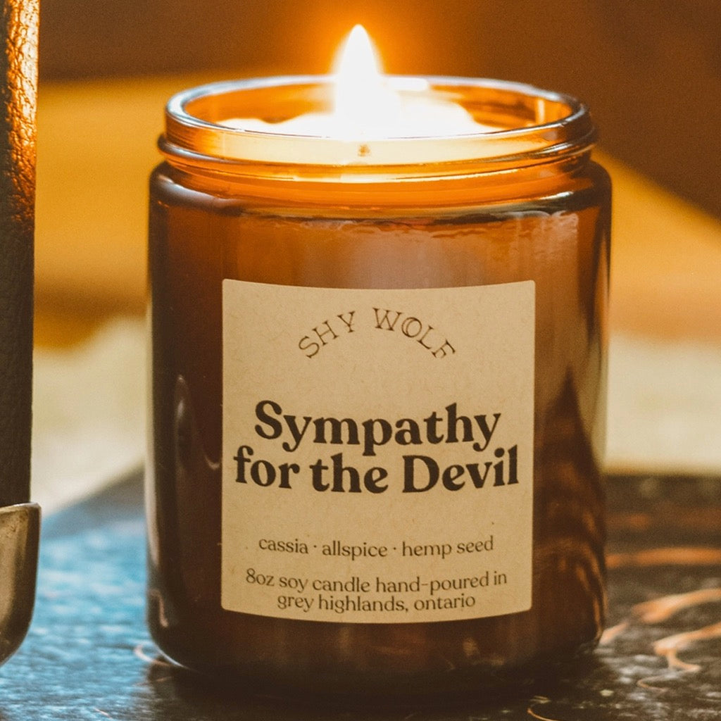 Sympathy for the Devil Soy Wax Candle burning.