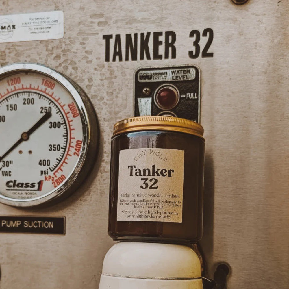 Tanker 32 Firefighter Candle in front of dash.